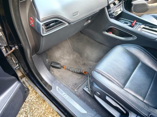 Jaguar F-Pace Passenger Footwell Before Detail - Stamford Jaguar F-Pace passenger footwell before interior detailing in Stamford, Lincolnshire.
