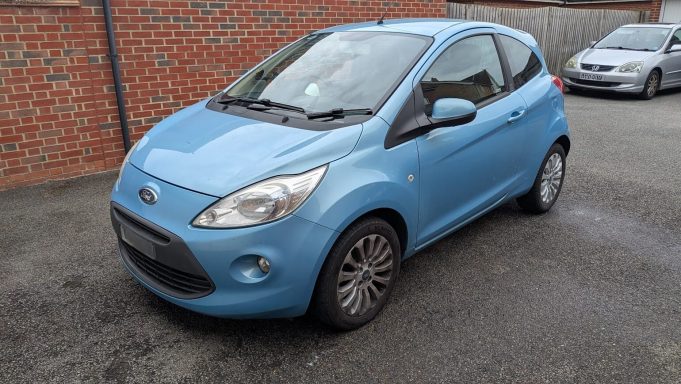Dirty Ford KA in  Yaxley, Peterborough  before exterior car detailing, with dull paintwork and dusty alloys.