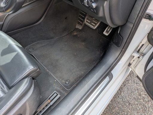 Audi S6 Driver Footwell Before Interior Detailing Audi S6 driver's footwell before interior detailing showing dirt and debris in carpeted areas