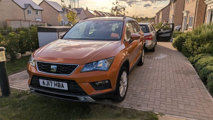 Seat Ateca in Ely, Cambridgeshire after exterior detailing, paintwork restored to a deep gloss with sharp reflections under evening light.