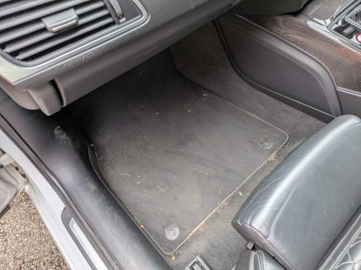 Image title Audi S6 Passenger Footwell Before Interior Detailing Audi S6 passenger footwell before interior detailing showing dirt and debris within the carpeted area