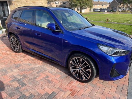 BMW X1 Finished Result Detailed BMW X1 with enhanced gloss finish after mobile detailing.