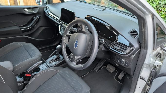 Driver’s side interior of a Ford Fiesta in Barnack, Peterborough after detailing, with clean floor mats