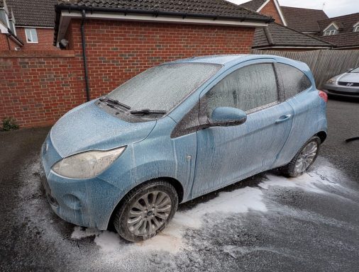 Ford KA in Yaxley, Peterborough covered in thick snow foam during pre-wash stage of car detailing.