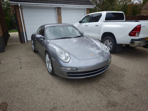 Porsche 911 Carrera Detail Finished Result - Cambridgeshire Finished silver Porsche 911 Carrera after a professional mobile car detailing service in Cambridgeshire.
