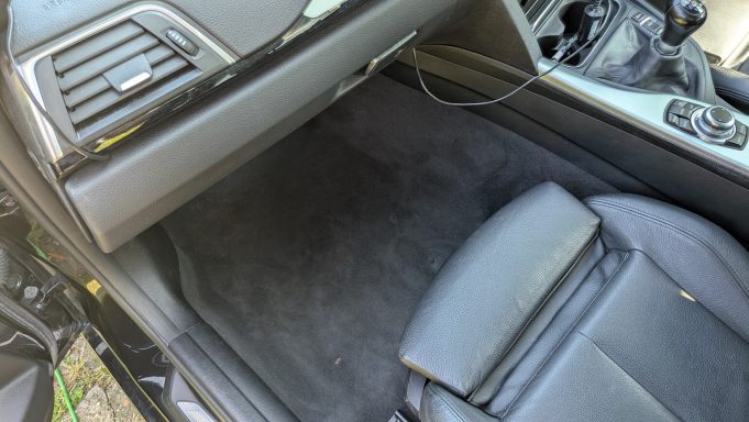 BMW Interior Detail - Stilton Peterborough BMW passenger footwell after interior detailing in Stilton, Peterborough.