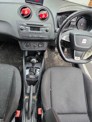 SEAT Ibiza dashboard and centre console before interior valet, cleaning and pet hair removal