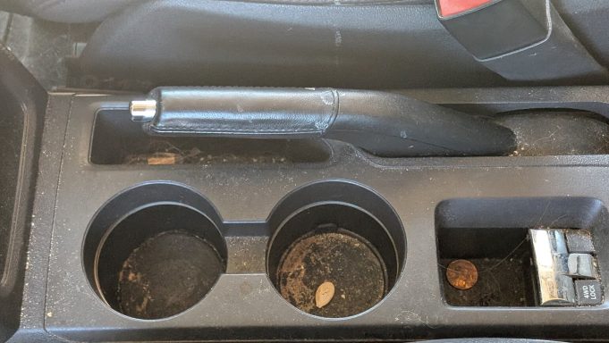 Jeep centre console and cup holders before detailing in Mildenhall Suffolk