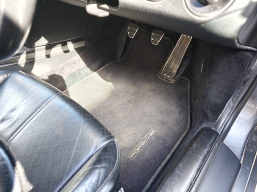 Porsche 911 Interior Before Detail - Cambridgeshire Porsche 911 driver footwell before interior detailing in Cambridgeshire.