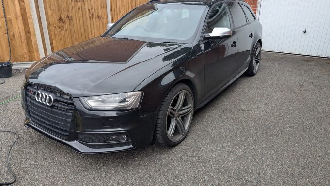 Black Audi S4 Avant in Huntingdon, Cambridgeshire before detailing, showing dull paintwork and brake dust on the wheels.