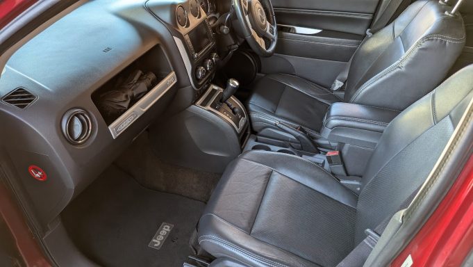 Jeep interior footwell in Mildenhall Suffolk after professional detailing, carpets and mats restored to a clean finish