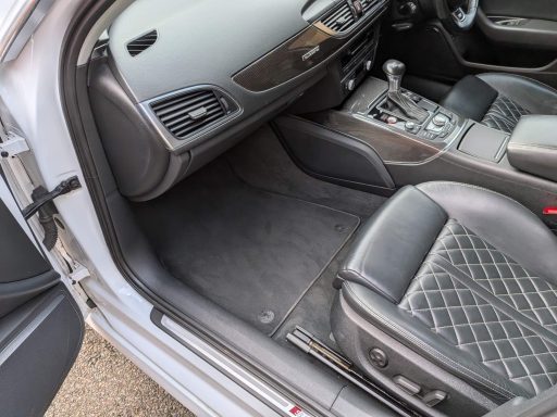 Audi S6 Passenger Footwell After Interior Detailing Audi S6 passenger footwell after interior detailing with cleaned carpets and refreshed interior